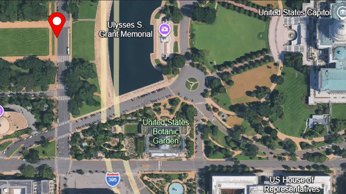 Aerial map of the Capitol’s west front with a red pin west of the Ulysses S. Grant Memorial and the Capitol dome at the right